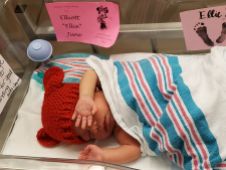 Children’s Hospital at Erlanger - NICU baby, Elliot Durall, wears one of more than 150 red hats donated by volunteer knitters